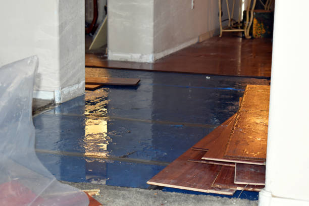 Professional Flood Damage Restoration technician working in Milltown, NJ